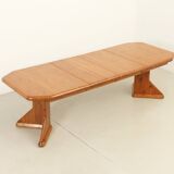Large extendable Danish dining table in solid pine, 1970s.