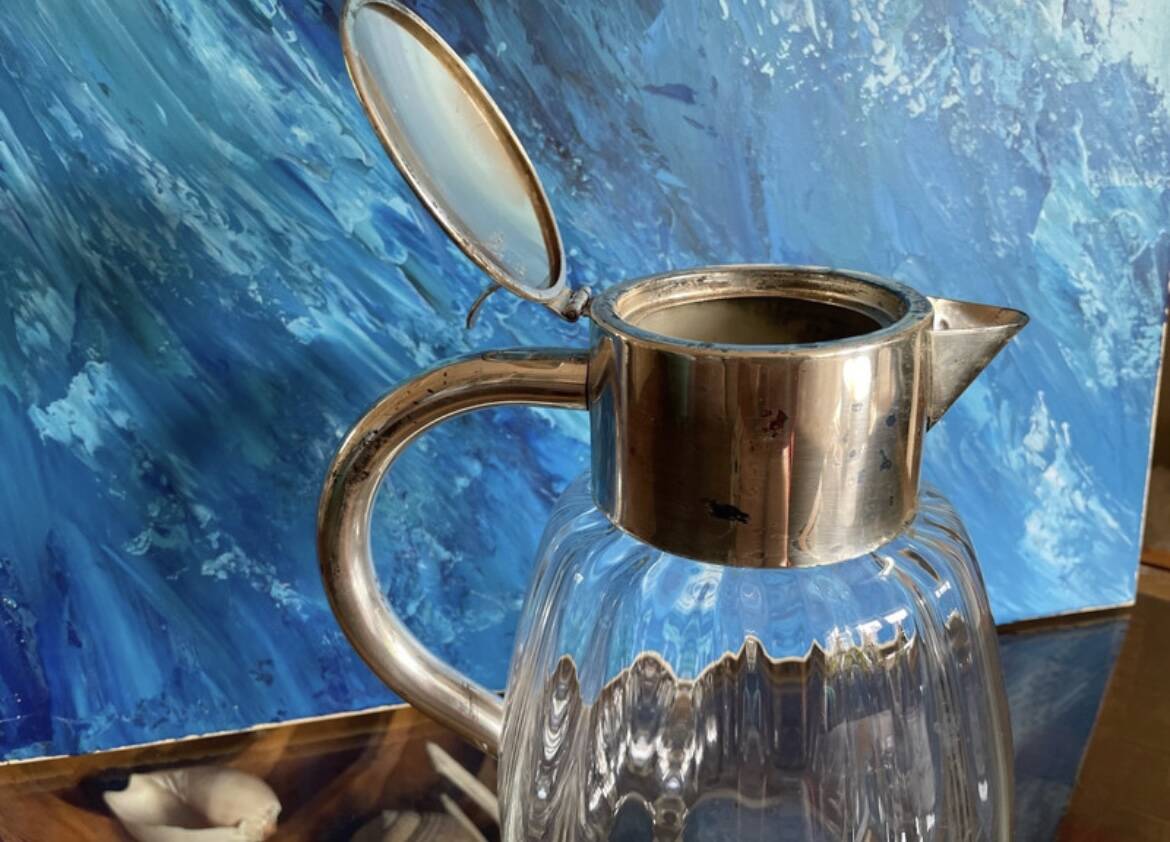 Antique pitcher with ice cooler tube