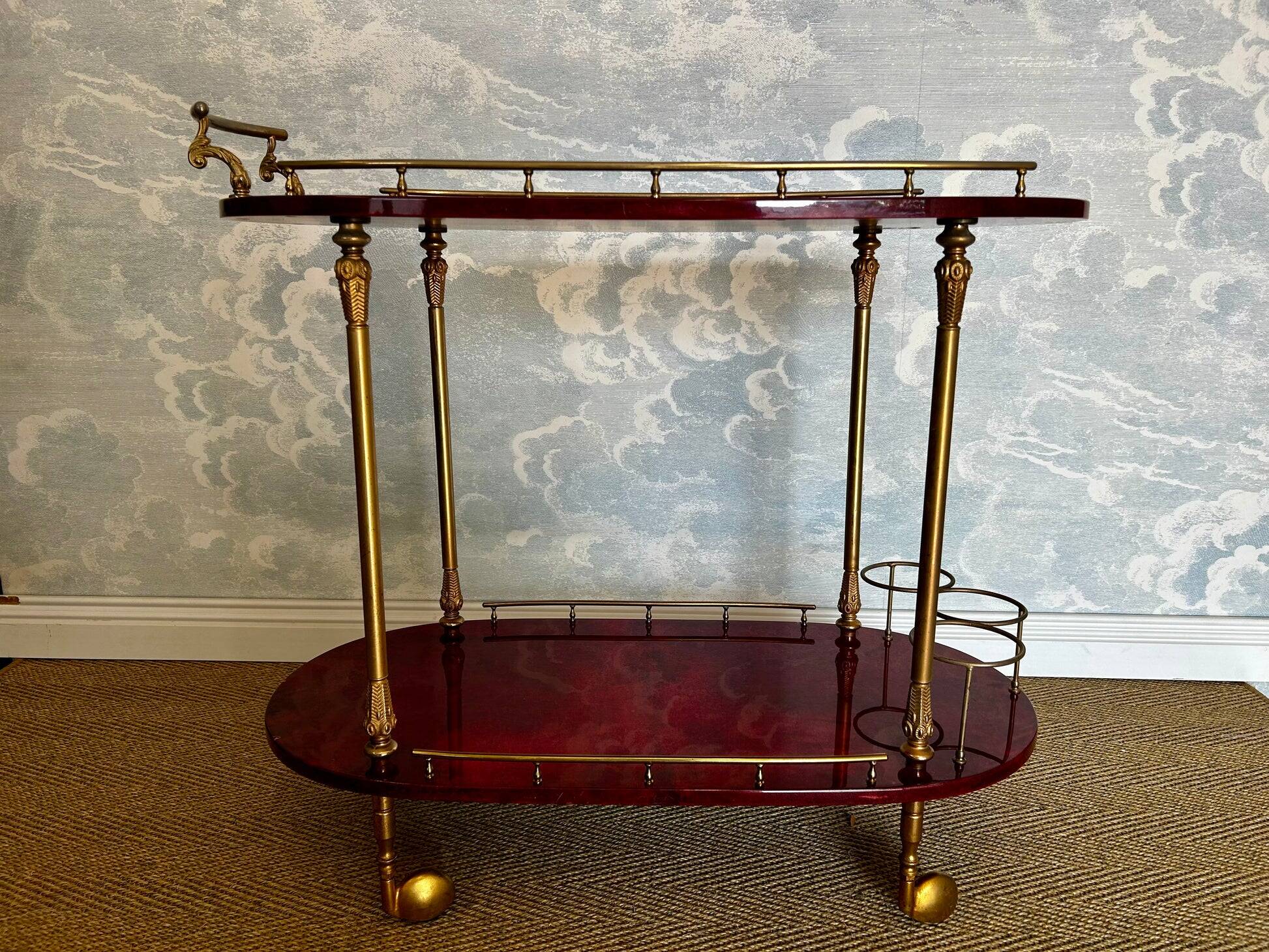 Cherry-red bar cart by Aldo Tura, Italy, 1960s, Hollywood Regency