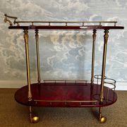 Cherry-red bar cart by Aldo Tura, Italy, 1960s, Hollywood Regency