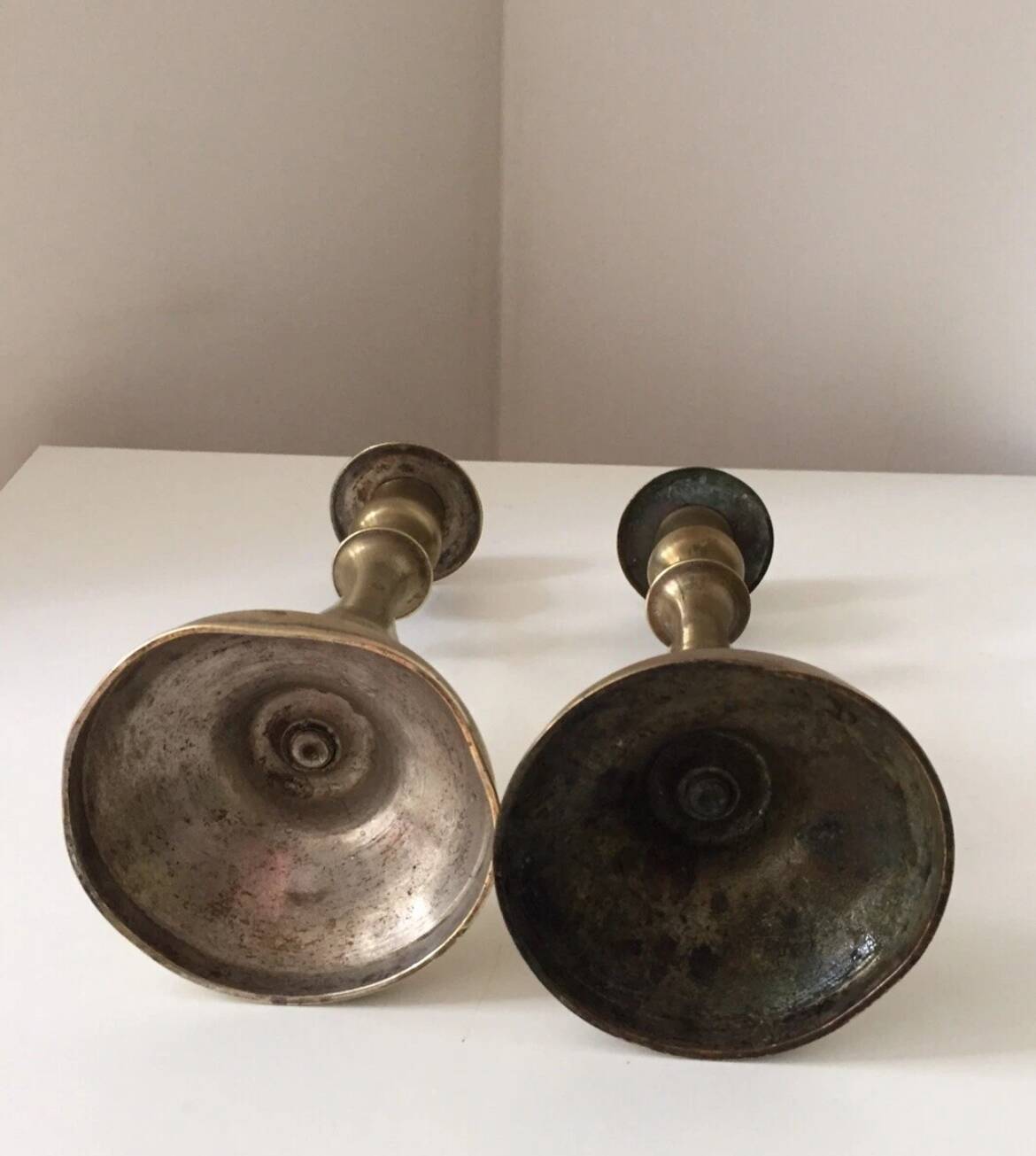 Pair of antique gilt brass candlesticks