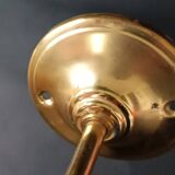 Brass and frosted glass wall lights
