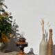 Foot of turned wooden lamp and carved
