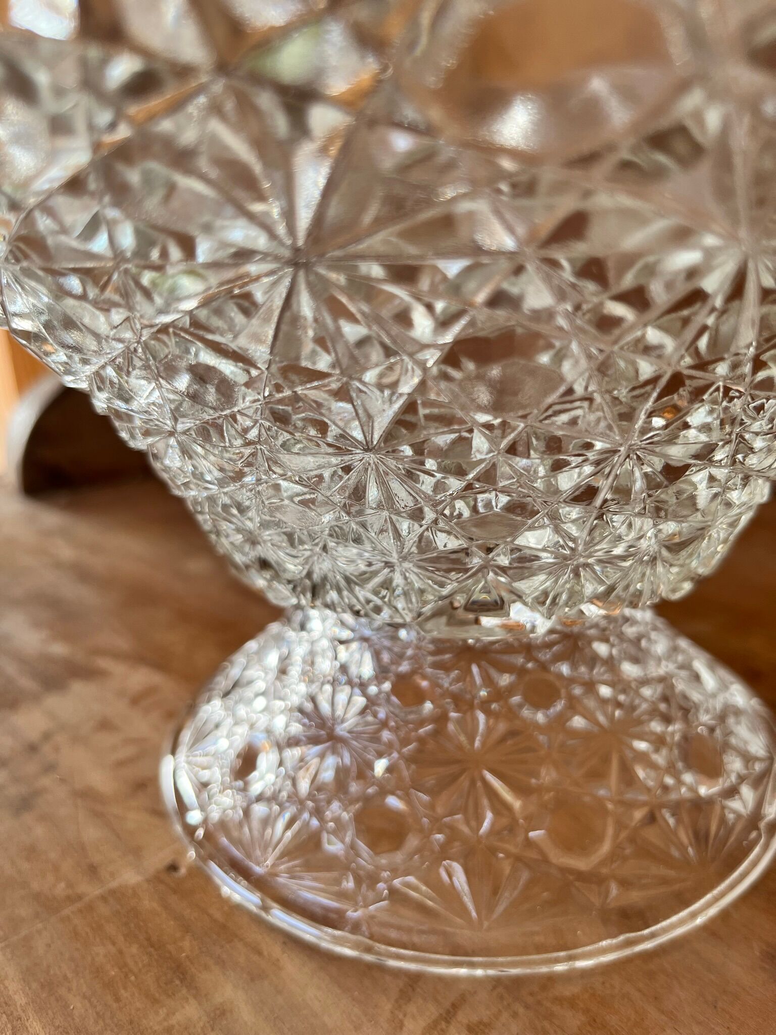 Antique standing cup in chiseled glass
