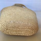 Old woven straw basket embroidered raffia