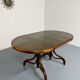 Vintage dining table with a cane top by Mundus from the 1970s.