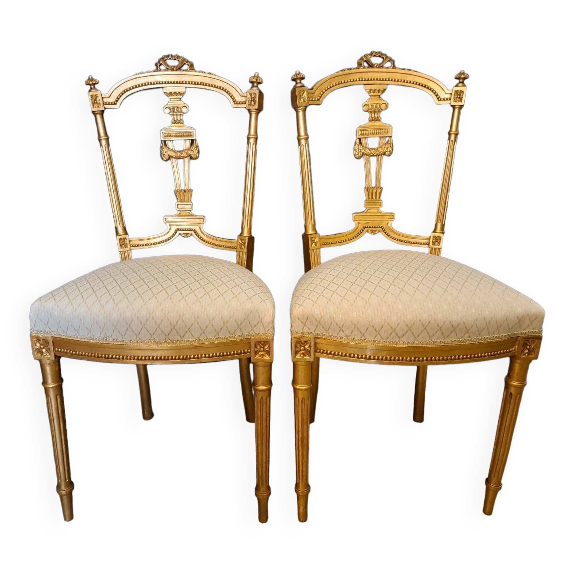 Pair of Napoleon III chairs in gilded wood