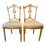 Pair of Napoleon III chairs in gilded wood