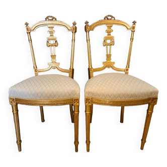Pair of Napoleon III chairs in gilded wood