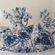 Round Gien porcelain dish with blue cyclamen motif