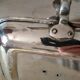 Antique metal and brass hand candle holder on rectangular base