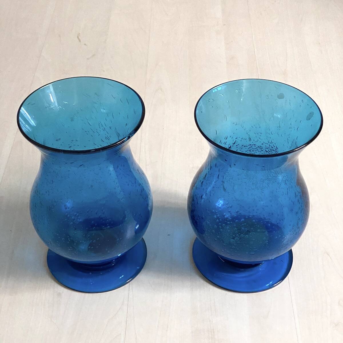 Pair of candle holders from the Biot glassworks, height 22 cm, diameter 15 cm.