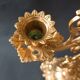 Antique three-light openwork brass church candelabrum.