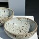 Duo of speckled ceramic bowls