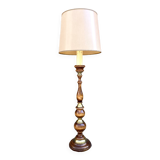 Floor lamp in wood and metal with brushed brass finish