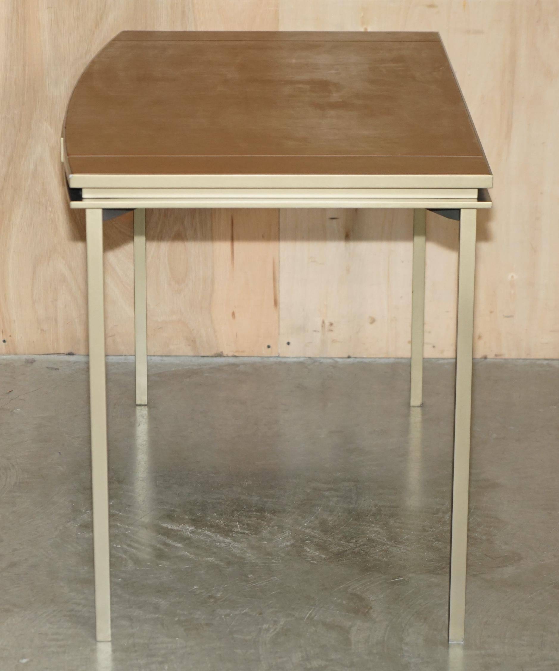 Modern mid-century writing desk signed Cartier in bronze and leather.