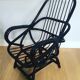 2 fauteuils noirs en rotin