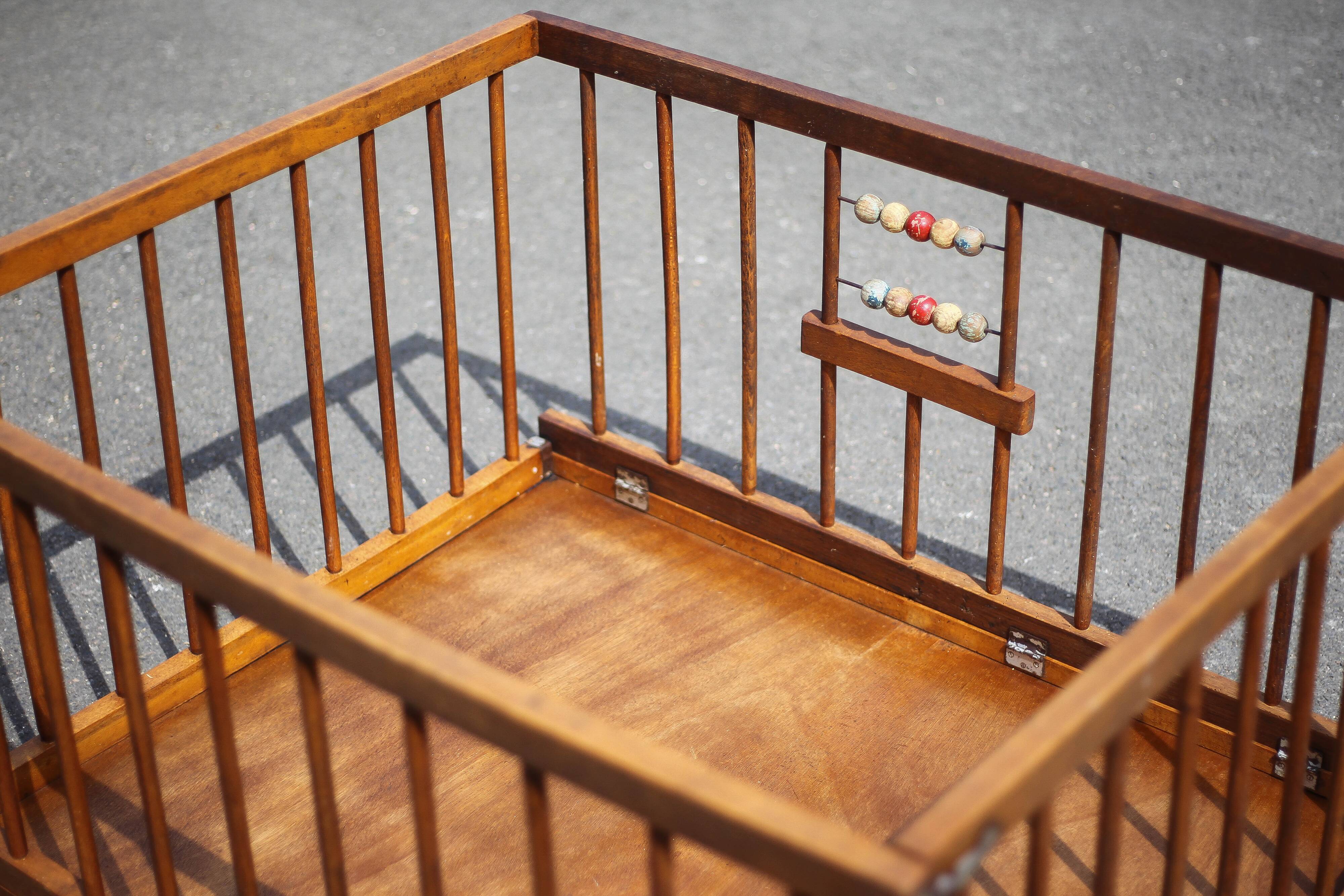 Folding wooden baby park on wheels, vintage park