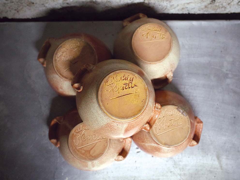 Set of 5 large sandstone bowls signed