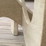 Trendy coffee table in glass and travertine