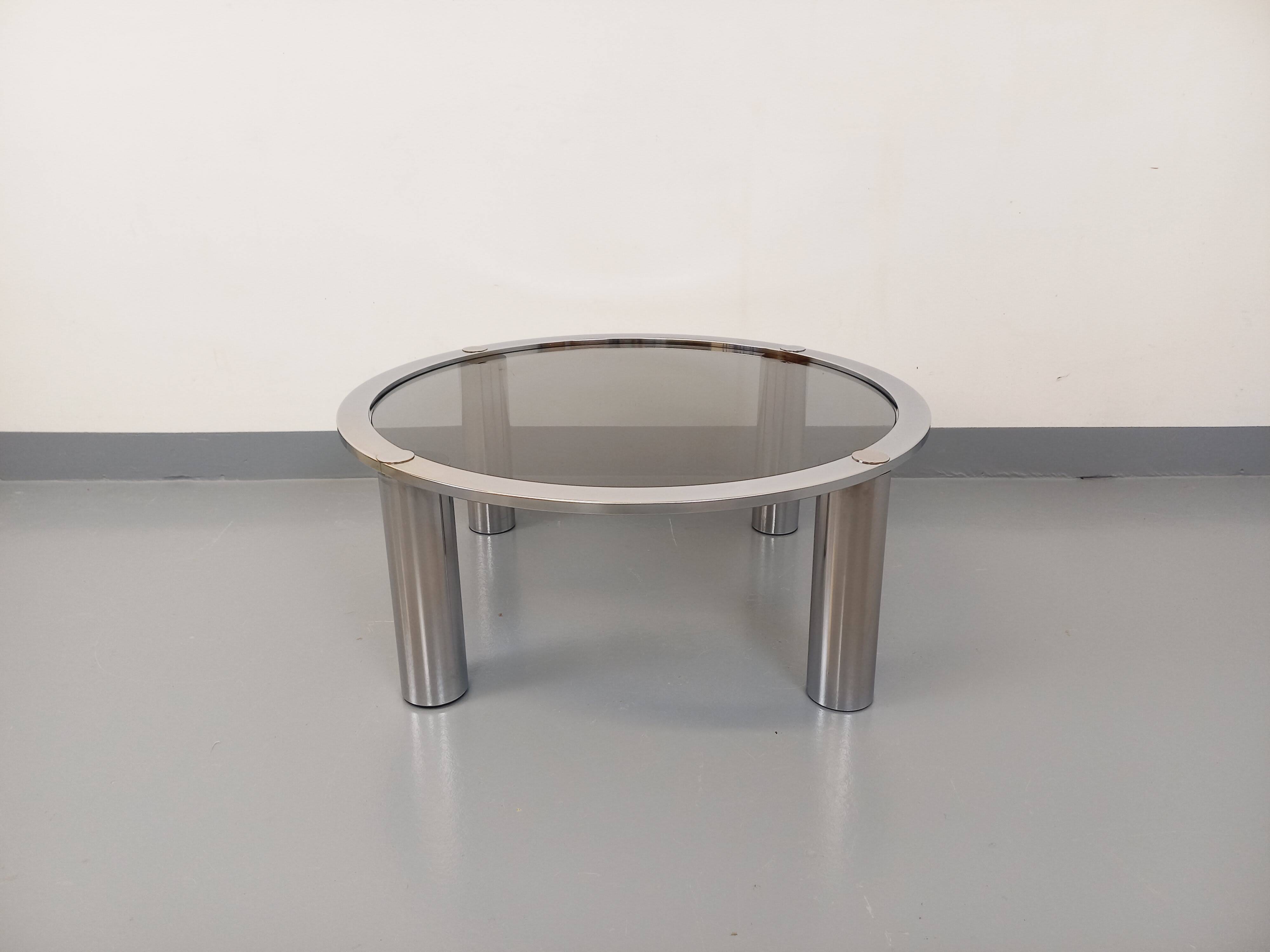 Vintage round coffee table in smoked glass and chrome metal from the 70s