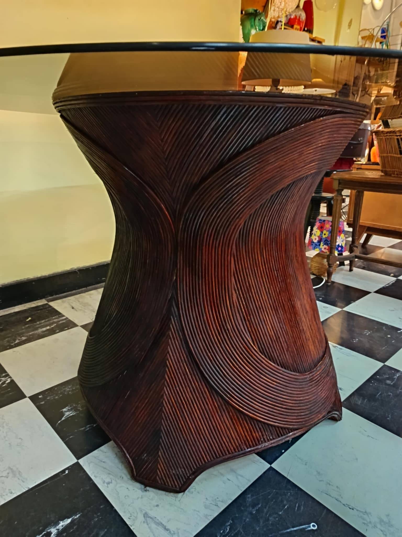Dining table with rattan marquetry