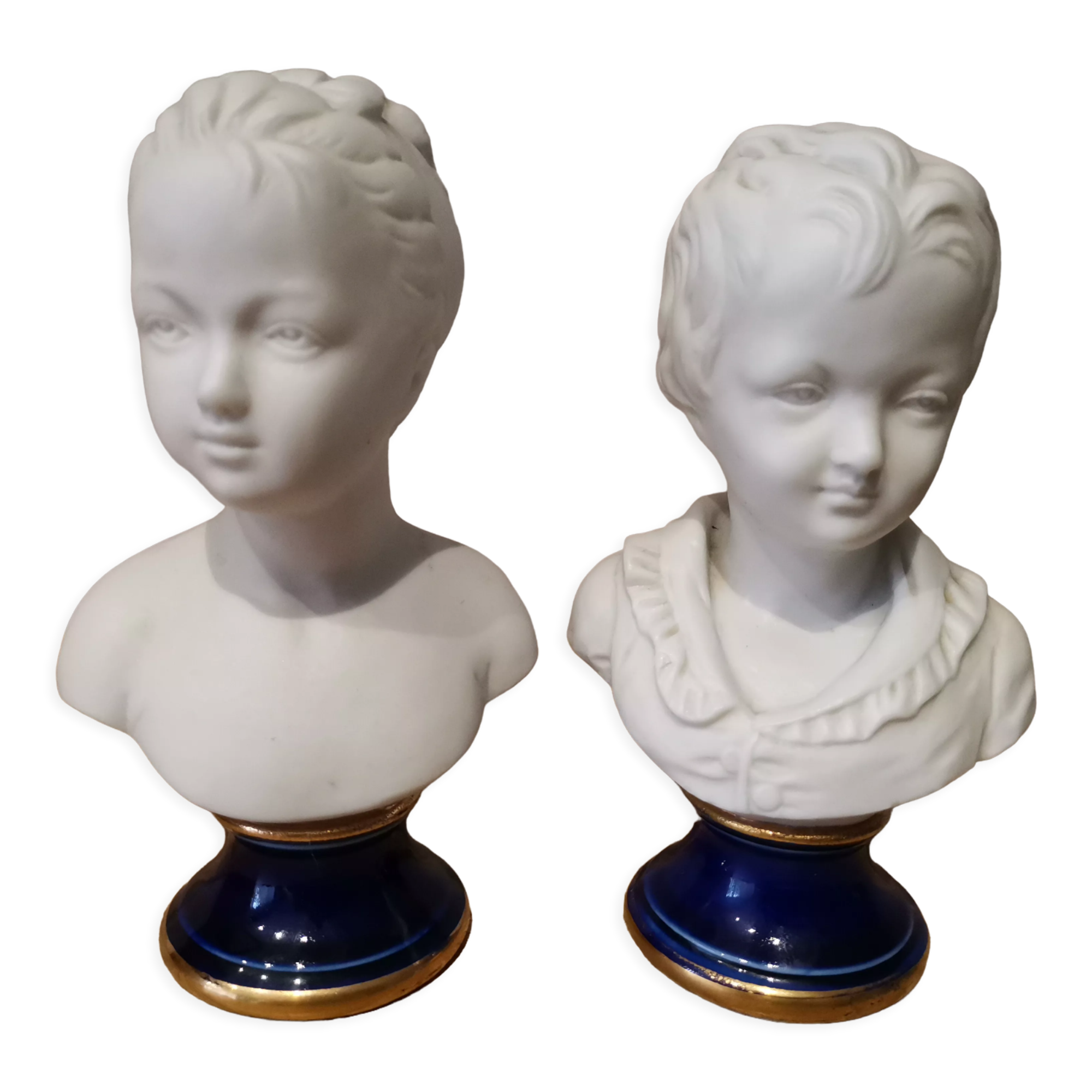 Signed children's busts