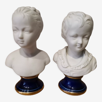 Signed children's busts