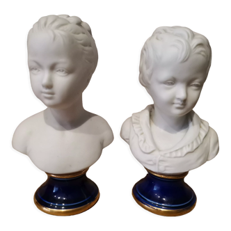 Signed children's busts