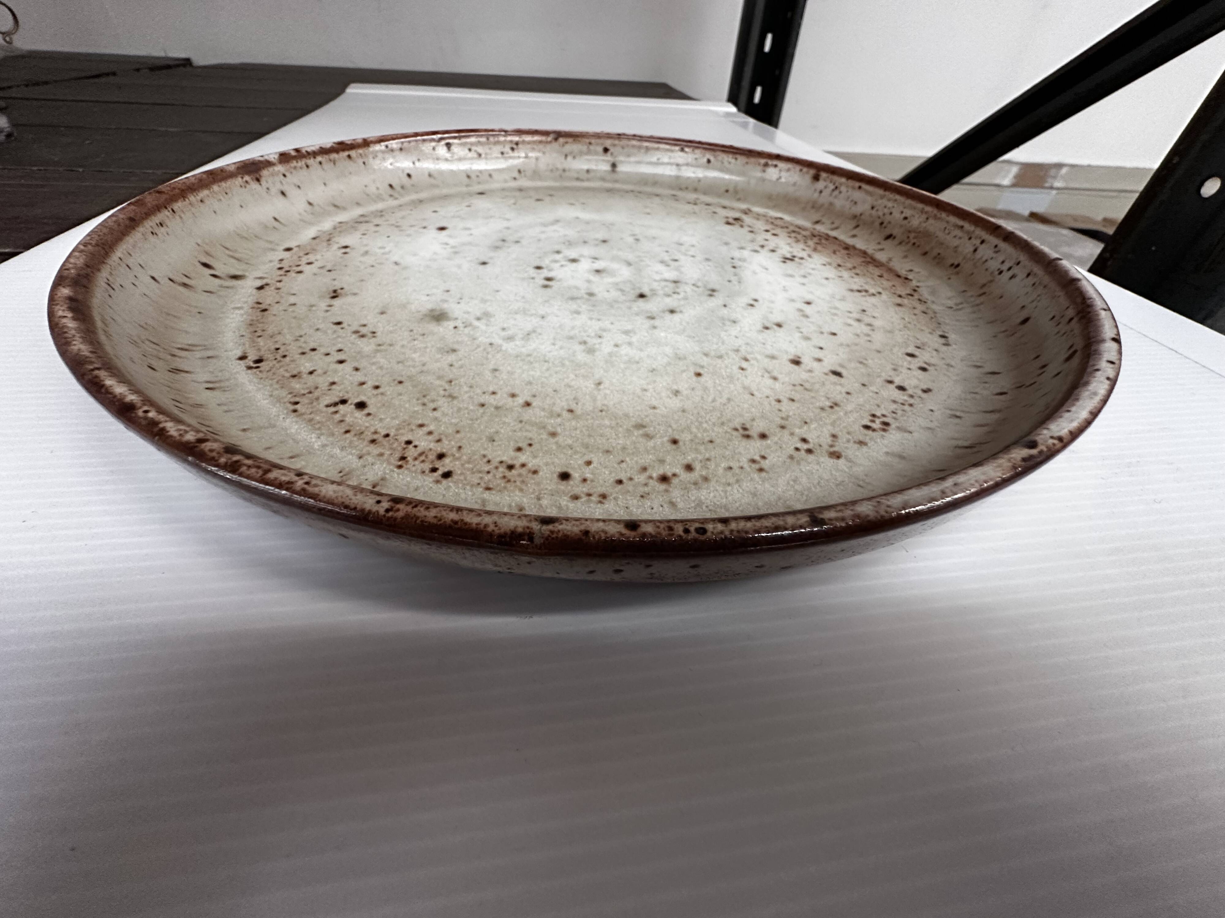 Large round stoneware dish signed Vallauris origin Diameter 30 cm