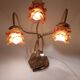 Lamp with brass leaves and glass paste flowers.