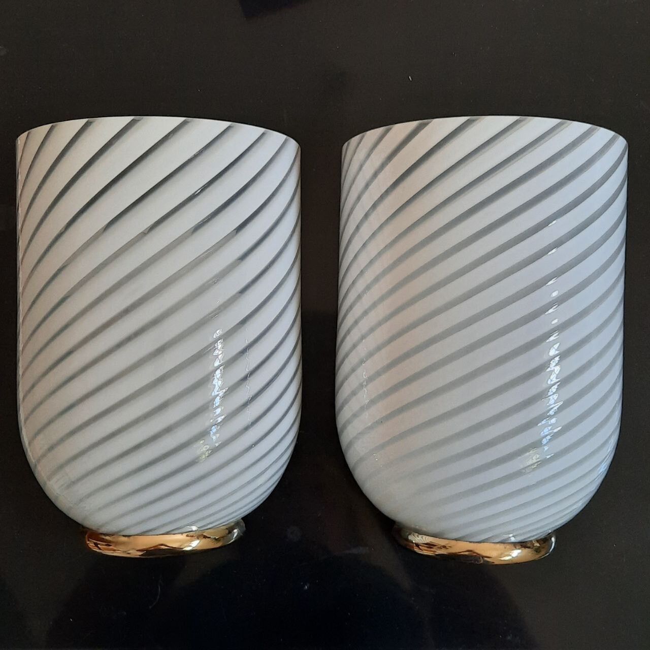 Pair of 80s wall lamps, striped Murano glass and brass