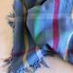Vintage tablecloth & napkins, blue with multicoloured stripes.