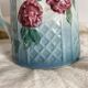Pichet en barbotine art nouveau roses