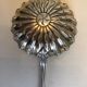 Silver sprinkler spoon