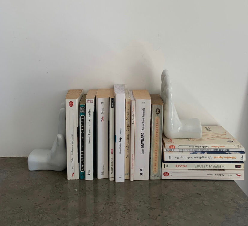 Vintage bookends in the shape of ceramic hands