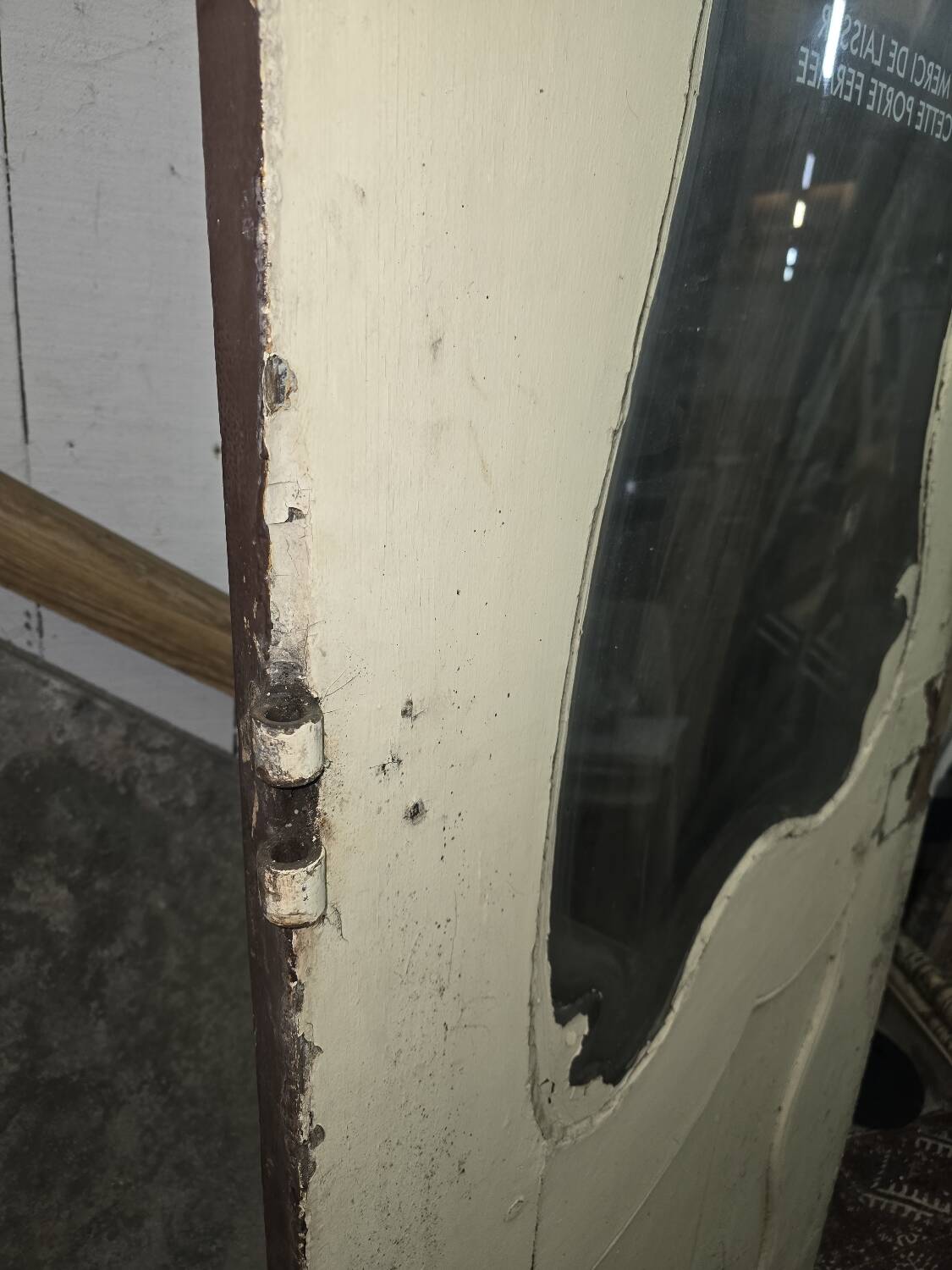 Old glass shop door in oak