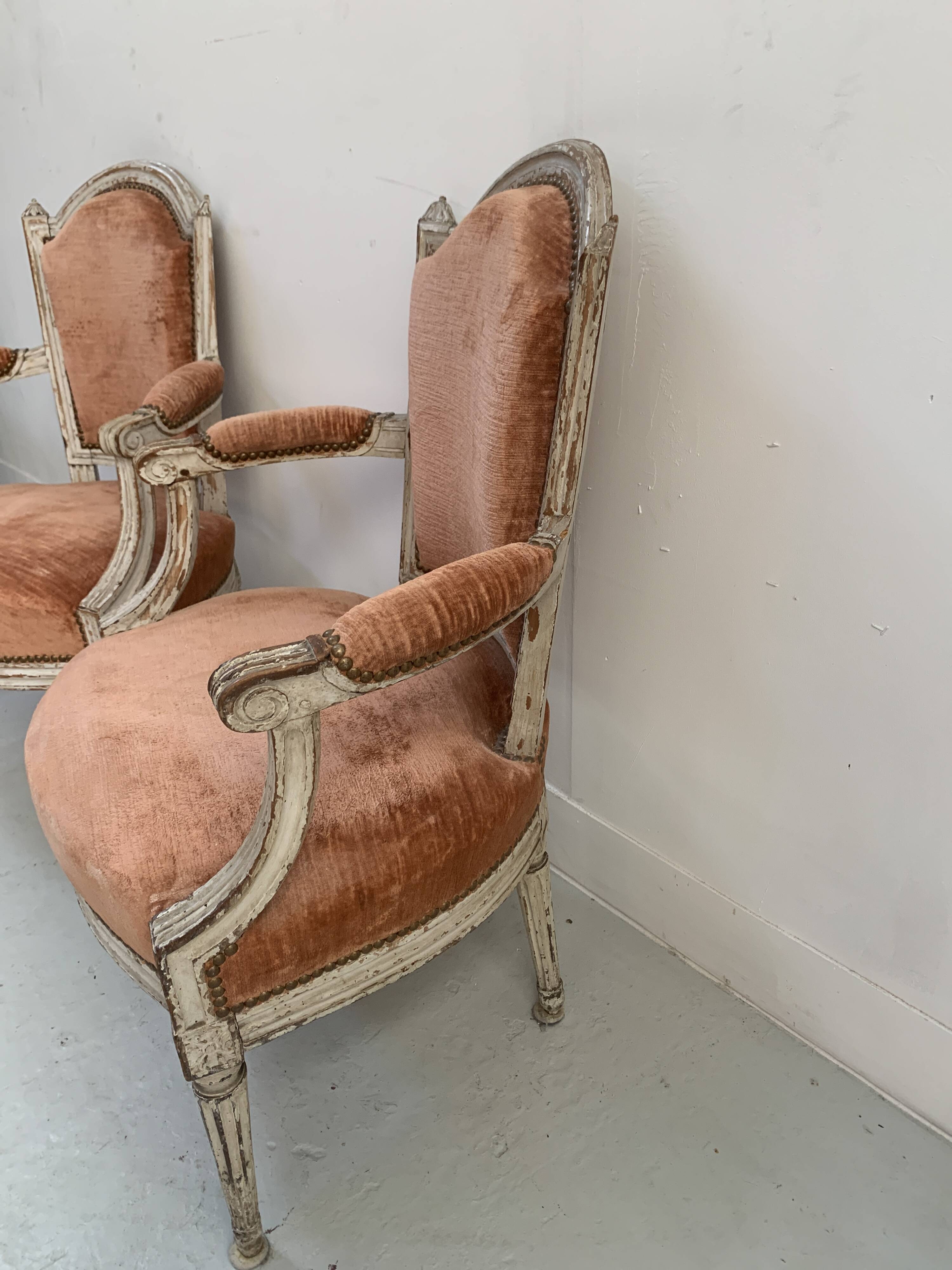 Pair of Louis XVI style armchairs in patinated beech, 19th century