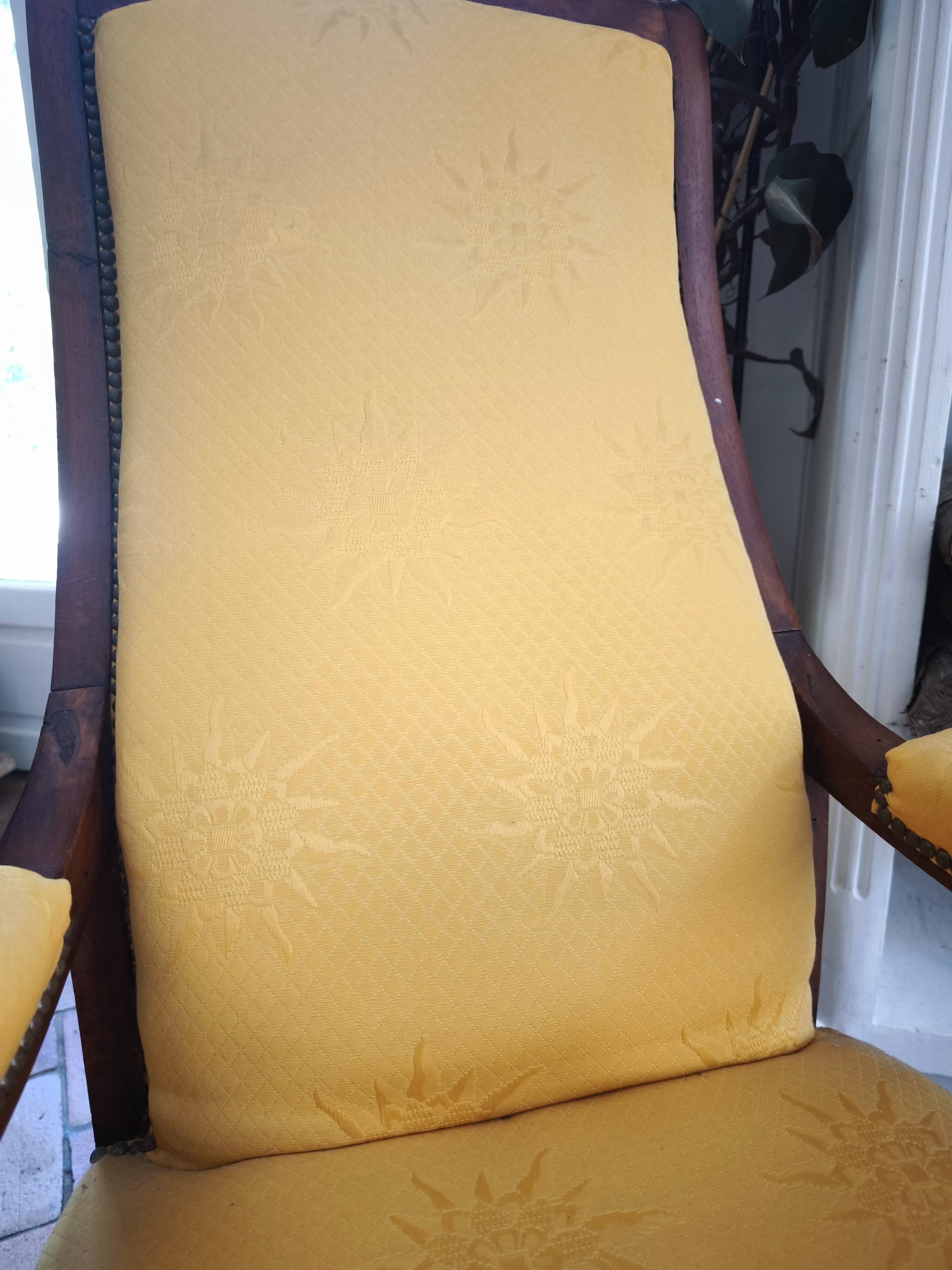 Yellow Voltaire armchair