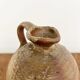 Small antique stoneware jar with handle