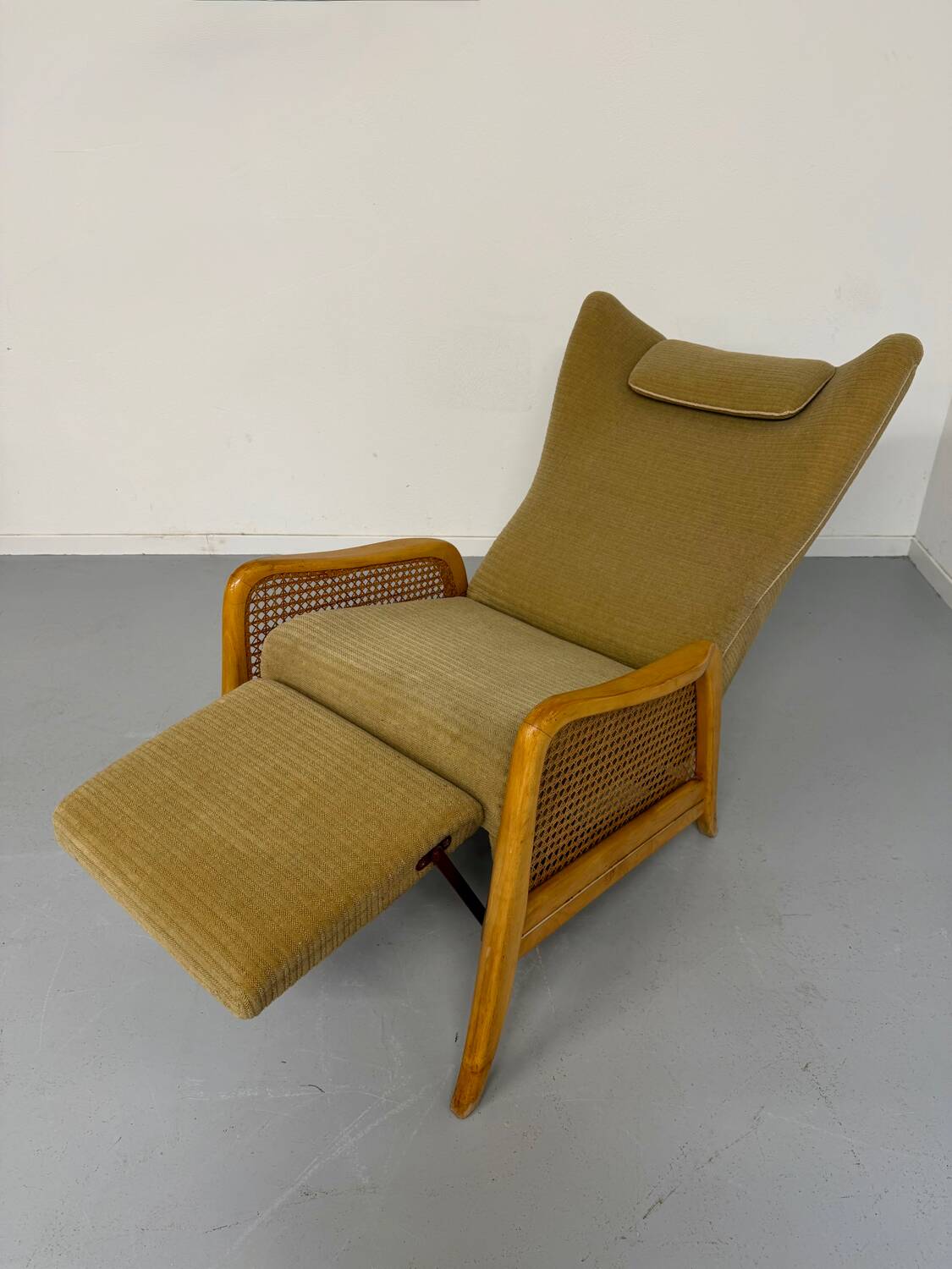 Vintage wingback recliner in Scandinavian design from the 1960s.