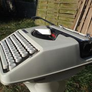 Baby hermes typewriter with manual job and his bag