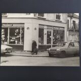Vintage silver gelatin print of a street scene in a shop window, 1970s, framed, 52 x 42 cm