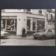 Vintage silver gelatin print of a street scene in a shop window, 1970s, framed, 52 x 42 cm