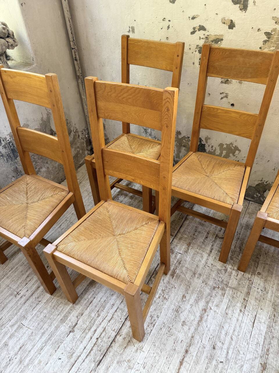 Set of 8 blond oak chairs with straw seats