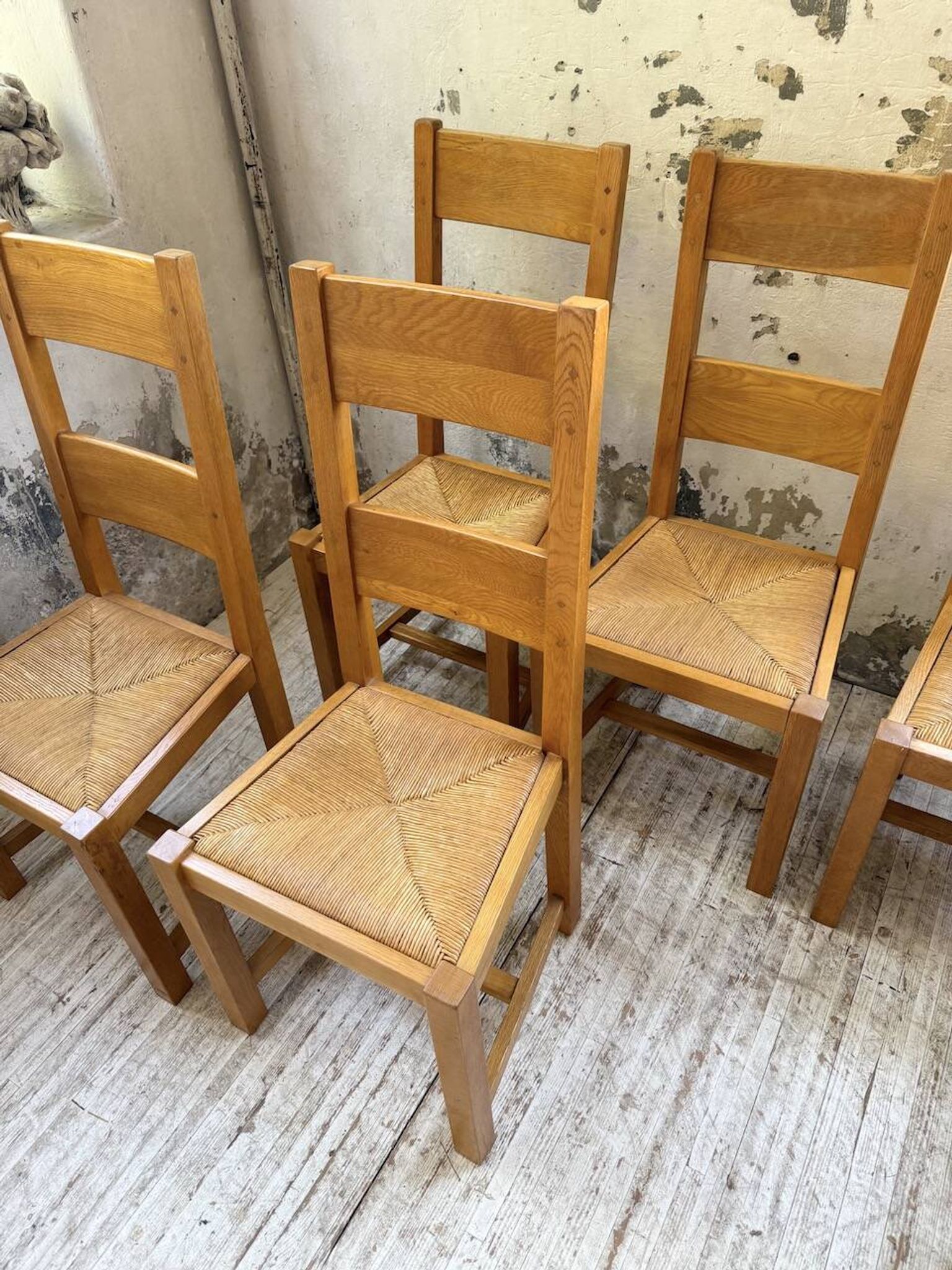 Set of 8 blond oak chairs with straw seats