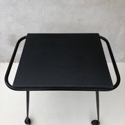 Black table on wheels from the 60s