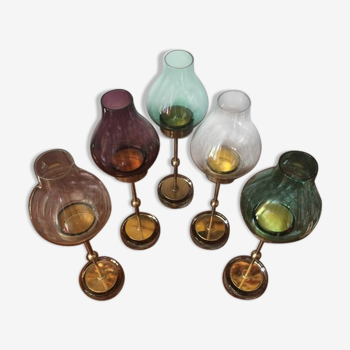 Gunnar Ander's set of five brass and glass candlesticks