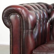 English cowhide Chesterfield club armchair in a beautiful red colour
