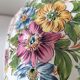 Antique vase with floral decoration in enamelled earthenware – timeless charm